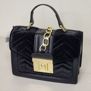 Elegant Black Velvet Handbag with Gold Accents